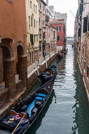 canals in venice with gondolaの写真素材