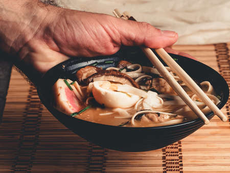 Ramen noodle soup with chicken breast, egg and spinachの写真素材