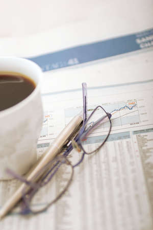 Coffee break at a financial officeの写真素材