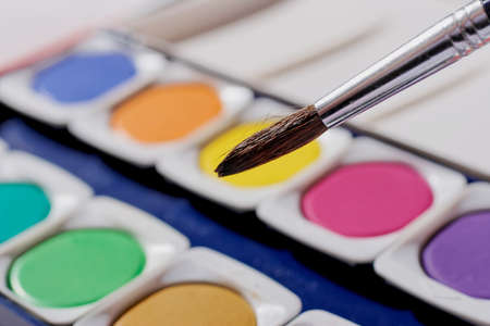 watercolor with brush on white backgroundの写真素材