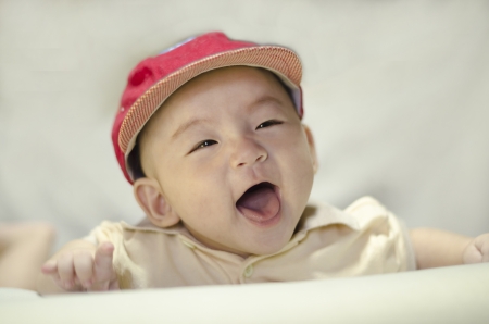 Cute infant smilingの写真素材