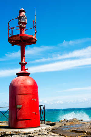 Small red lighthouseの写真素材