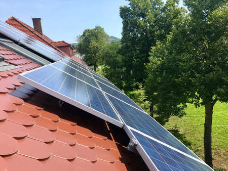 House roof with solar panels on top