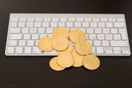 bitcoins on keyboardの写真素材