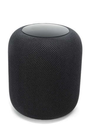 Using an Apple HomePod speaker on whiteのeditorial素材