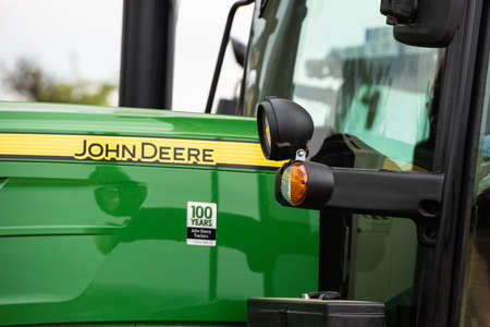 Closeup of an agricultural tractor by John Deereのeditorial素材