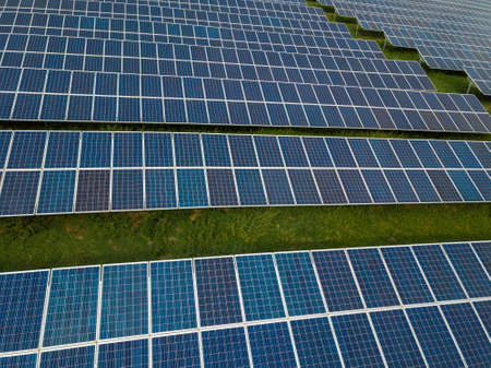 Aerial view of solar panels in solar farmの写真素材