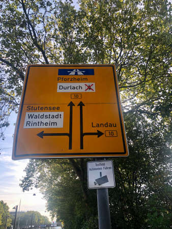 Karlsruhe, Germany - September 16, 2019: An additional sign underneath a traffic sign in Karlsruhe is outlining a testing area for autonomous driving which is currently in evaluation by German car manufacturersの写真素材