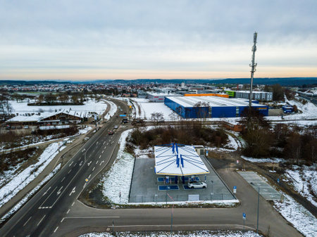 Aerial photo of the newly opened electric vehicle charging station operated by EnBW in Rutesheim near Stuttgart at the highway A8.のeditorial素材