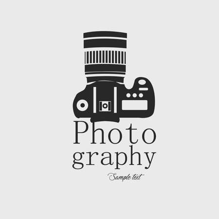 Icon for professional photography. Camera and text in dark gray on white background vector image.のイラスト素材