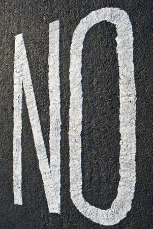 The letters NO painted on tarmacの写真素材
