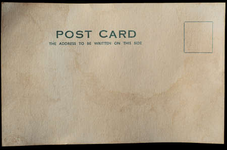 A blank postcard, aged and weathered for antique or vintage effect.