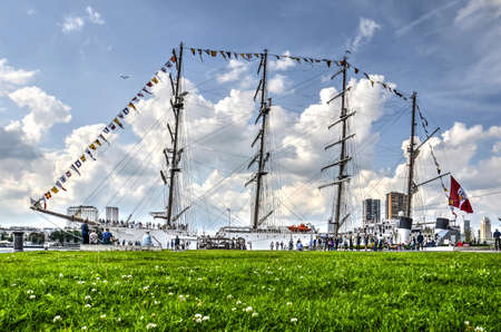 Rotterdam, The Netherlands, August 9, 2017: View across the lawn in front of Hotel New York towards...