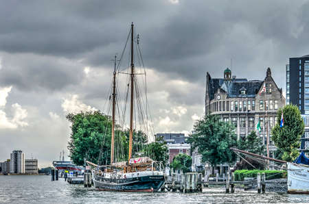 Rotterdam, The Netherlands, August 13, 2018: two mast  sailing yacht moored at the historic Veerhaven harbour in Scheepvaartkwartier neighbourhoodのeditorial素材