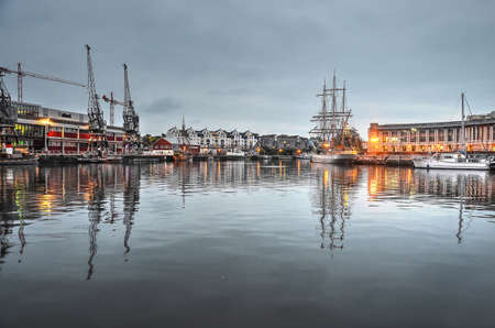 Bristol, England, May 30, 2014: view from Narrow Quay across the calm water of the Flaoting Harbour at duskのeditorial素材