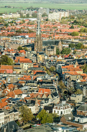 Leeuwarden, The Netherlands, November 3, 2018: Aerial view of the old city center, interected by a curving canal, with St. Bonifatius church, more modern neighbourhoods and the countryside beyondのeditorial素材