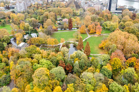 Rotterdam, The Netherlands, November 12, 2018: aerial view of the Park in autumn with a large variety of trees in vibrant, almost psychedelic colorsのeditorial素材