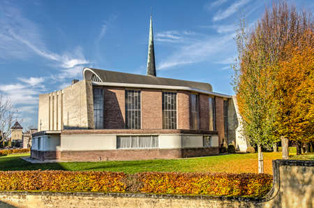 Valkenburg, The Netherlands, November 18, 2018: modern church building built with brick and marl stone, designed by architect Theo Boosten and opened in 1961のeditorial素材