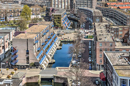 Rotterdam, the Netherlands, April 18, 2015: aerial view of Stokviswater canal seperating residential...
