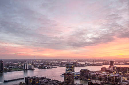 Rotterdam, The Netherlands, November 12, 2018: a spectacular sky at sunset over the river Nieuwe...