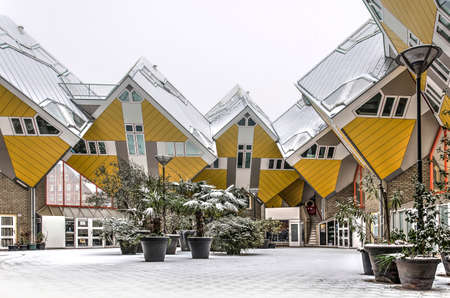 Rotterdam, The Netherlands, March 3, 2018: the cube houses and the public space in between them are...