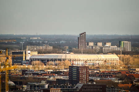 Rotterdam, The Netherlands, December 10, 2018: long distance aerial view of legendary stadium De Kuip, home of football Feyenoord, surrounded by mainly residential neighbourhoodsのeditorial素材