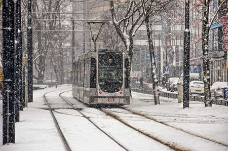 Rotterdam, The Netherlands, January 22, 2019: city tram at Westersingel running its usual service during a blizzardのeditorial素材
