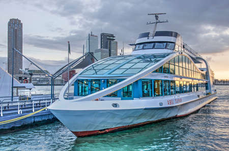 Rotterdam, The Netherlands, december 4, 2018: large tourist boat used for harbour tours moored at the pier at Spido headquartersのeditorial素材