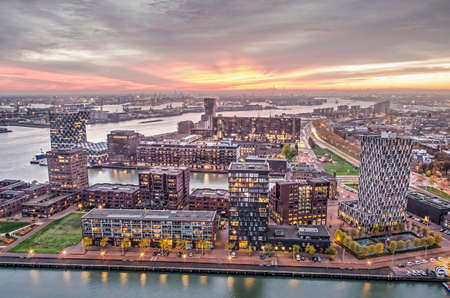 Rotterdam, The Netherlands, November 12, 2019: night falls over the new urban developments on Mullerpier and Lloydpierのeditorial素材