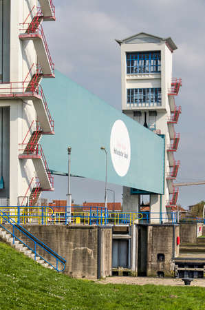 Capelle aan den IJssel, The Netherlands, April 14, 2019: the  tidal barrier in the Hollandsche IJssel river protects the land beyond, with elevations below sea level, from floodingのeditorial素材