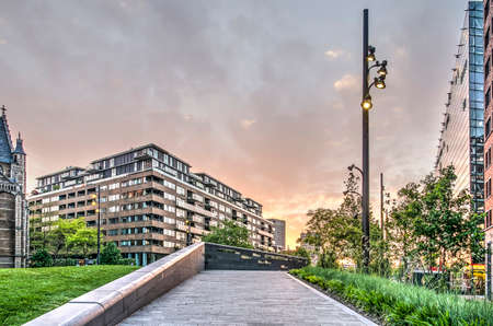 Rotterdam, The Netherlands, May 15, 2019: path leading up an artificial hill on recently refurbished Binnenrotte market square under a beautiful evening skyのeditorial素材