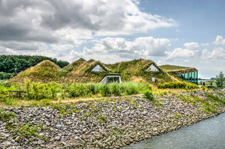 Werkendam, The Netherlands, July 3, 2019: view of the Biesbosch museum on its island in the national parkのeditorial素材