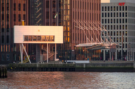 Rotterdam, The Netherlands, February 3, 2019: the quay of Koningshaven with modern office buildings...