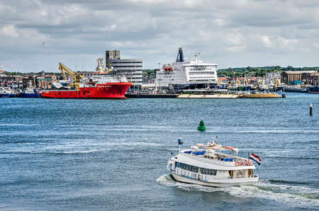 IJmuiden, the Netherlands, July 14, 2019: ferry boat for pedestrians and cyclists crossing the North Sea Canal from the pier at Velsen Northのeditorial素材