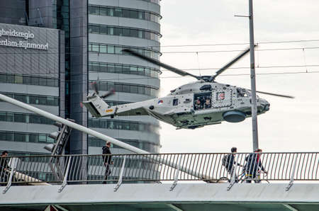 Rotterdam, The Netherlands, September 6, 2019: a Royal Navy helicopter navigating close to Erasmus bridge during the Wereldhavendagen (World Port Days) festivalのeditorial素材