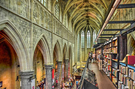 Maastricht, The Netherlands, September 8, 2019: view from one of the floors with books along the nave towards the chancel in de former Dominican church, now a bookstoreのeditorial素材