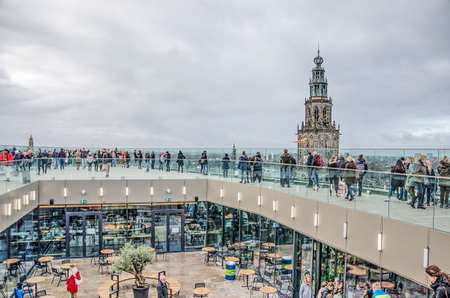 Groningen, The Netherlands, December 7, 2019: many people on the roof of the recently completedForum...
