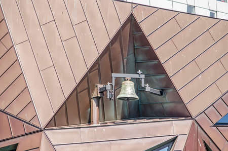 Rotterdam, The Netherlands, April 26, 2020: the bell of Pauluskerk (Saint Paul's church) with its irregular volume of copper-cladded trianglesのeditorial素材