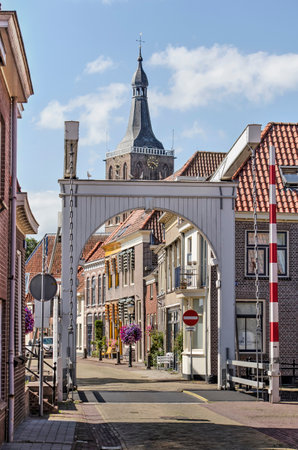 Hasselt, The Netherlands, August 2, 2020: the wooden Sluisbrug (Sluice Bridge) is the southern entrance to the old townのeditorial素材