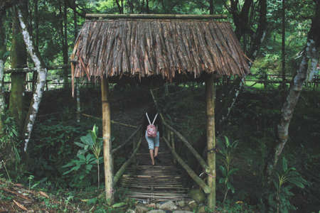 A girl crossed a bridgeの写真素材
