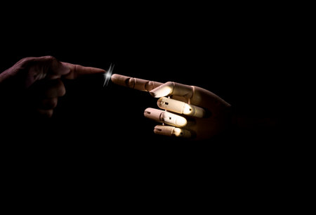 hands bumping finger in the dark with black background one wooden hand another human creative...