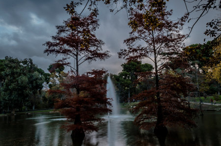 Photograph of the Crystal Palace in Parque del Retiro in Madrid with a sky full of cloudsのeditorial素材