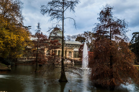 Photograph of the Crystal Palace in Retiro Park in Madrid with blue skyのeditorial素材