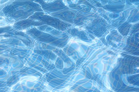 pool water with the sun reflecting on the surface making different patterns