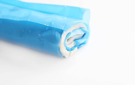 frozen rolled pastry packaged ready for use isolated on a plain background with shallow depth of fieldの写真素材