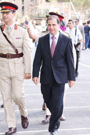 The president of malta, Dr. George Abela walking next to Brigadier Martin Xuereb at the 40th anniverssary of the establishment of the Malta Land Force which was later renamed 'The Armed Forces of Malta' (AFM)のeditorial素材