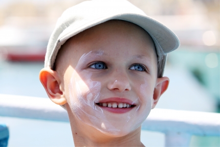 child with cancer and a lovely smile の写真素材
