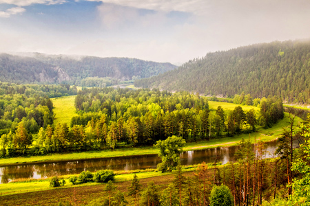 Landscape with river and fresh meadows