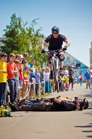 Ufa - April 30, 2015: Bike stunt, Festival in Sipaylovo park, Ufa city, Russiaのeditorial素材