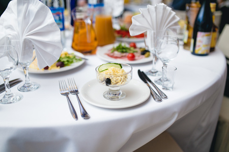 Beautifully decorated table in the restaurantの写真素材